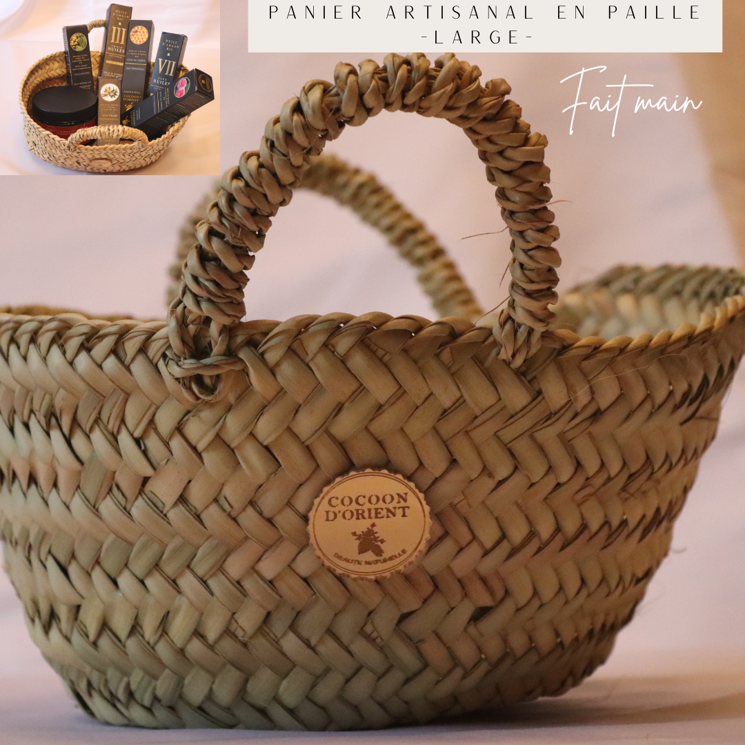 Panier artisanal en paille avec produits Cocoon d'Orient pour une présentation élégante